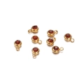 Vue détaillée de 7 breloques dorées avec zircons rouges pour la fabrication de bijoux DIY - 20 Pièces / 11.5g / Cadre Doré / Zircone Marron Orangé