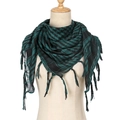 Close-up of dark green and black houndstooth pattern scarf with tassel edge details - Peacock Blue
