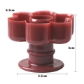 Detailansicht der Donut-Form mit Abmessungen 8,3 cm oben und einer Höhe von 6 cm - Kunststoff / Blume