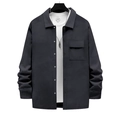 Close-up of textured knit lapel jacket with silver metal buttons and chest pocket - Dark Gray