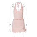 Detail view of pink halter neck top and ruffled mini skirt set on a mannequin - S / Pink