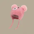 Pink knitted baby winter hat with plush pom-poms, earflaps and embroidered bear face - Chenille Bear Hat Pink (for Ages 1-4)