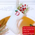White knitted Christmas stocking with red embroidered letter D and holly leaf detail - Letter D