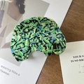 Detail of handmade elephant hair claw clip with colorful marble pattern on wood table - 6#Green