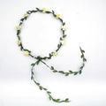 Floral bridal headband featuring pale yellow roses and green leaf ribbons on vine - Beige
