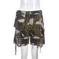Detail view of camouflage denim shorts featuring frayed tassel hem and cargo pockets - S / Brown