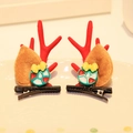Brown reindeer antler hair clips with mink fur, red antlers, and yellow bows on a white plate - Hair Clip 5# (Pair)