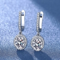 Elegant silver pendant earrings featuring large oval-cut clear stones and micro-pave halo - A Pair Of Platinum-gold Leds-167