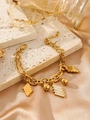 Detail of 18k gold chain bracelet with lightning and rhinestone charms on silk - Lightning Bolt & Ball Style(ZHB1074 Gold)