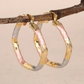 Tricolor hoop earrings in gold, silver and rose gold with woven texture on a wooden branch - Tri-color Hoop Style (E4490) / 37mm