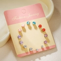 Golden titanium steel earring set with colorful rhinestones on a display card - Gold Colorful Rhinestone (E1898-1)
