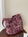 Detail of vintage pink rose jacquard texture on canvas shoulder bag under natural light - Single Shoulder Strap Underarm Bag
