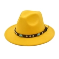 Detail of yellow fedora hat with brown leather band, silver studs and turquoise stones - Yellow