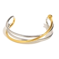 Bracciale rigido aperto intrecciato minimalista in oro e argento con sfere lucide - Bicolore Oro e Argento