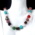 Faceted natural stone beaded necklace with multi-color crystal quartz on model bust - Colorful
