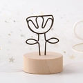 Vintage wooden base photo holder with a black metal flower wire clip for home decor - Flower