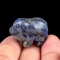 Handcrafted sodalite gemstone pig figurine with blue and white marble textures - Blue Spot Stone