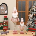Pink sequined Christmas gnome plush with telescopic legs and geometric patterned outfit - Small Retractable Santa Claus