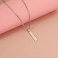 Detailed view of silver stainless steel bar pendant with box chain on pink backdrop - Steel Color (6*27mm)(MP208)