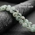 Natural Tianshan Blue stone round beads bracelet with unique black mineral spots - Tianshan Blue