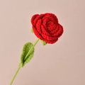 Handmade crochet red rose with green leaves crafted from soft yarn for DIY bouquets - Red Rose