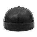Classico berretto Miki in pelle PU nera con grana litchi e design retrò con bordo risvoltato - Nero