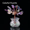 Multicolor fluorite crystal tree ornament with copper wire in glass base on black background - Fluorite (18 Grains) Fish Tank Jar Tree