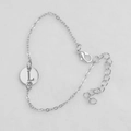Silver thin chain bracelet featuring a hollow round pendant with engraved letter L - Silver L