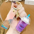 Portachiavi creativo con bevanda al latte e gatto viola con cinturino olografico - Viola