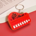 Mini red piano keychain toy with musical notes and 7 functional numeric keys - Bag Packaging / Macaron Red