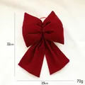 Large festive red velvet 3D bow decoration measuring 32cm by 19cm for Christmas trees - Small Wine Red Bow