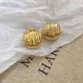Detail view of round golden metal stud earrings with unique vertical textured pleats - Vertical Ruched Style (HE27807) / Gold
