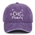 Close-up of Cat Mom white embroidery on vintage washed purple cotton baseball cap - Purple