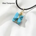 Collana con turchese a forma di stella avvolta in filo d'oro e cordino nero - Turchese Blu