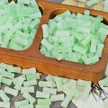 Macro view of translucent light green bamboo-shaped glass beads for DIY jewelry making - Jade-like Light Green (J121#)