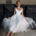 Elegant white V-neck bridal gown with satin top and tiered tulle skirt in French style - US size 2 (S) / Ivory
