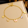 Detail of gold Figaro chain anklet with flower, heart, butterfly and bird charms - Flower Butterfly & Bird Style (B1585)