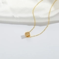 Elegant gold necklace with a zircon-encrusted cylindrical ring pendant on silk - Gold Hollow Ring Style (XL4111-3)