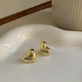 Macro shot of gold heart stud earrings on a white ceramic tray for a luxury aesthetic - 20# Gold Shiny 3D Heart Studs (20# Silver Earring Post-Gold)