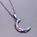 Detail of crescent moon necklace with iridescent finish and hammered texture surface - Iridescent Pendant Necklace