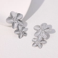 Elegant vintage silver double flower earrings with textured metallic finish and gold plating - Steel