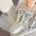 Close-up of knit cream mid-tube socks featuring a cute 3D plush sheep design and text - One Size / White