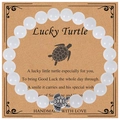 8mm white stone bead turtle bracelet with lucky charm on vintage display card - White Jade