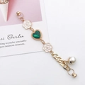 Golden DIY phone case charm with green heart crystal, white camellia and pearl decoration - Green