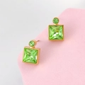 Detailed macro view of square green crystal earrings with elegant gold plated settings - Olive Green