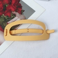 Matte yellow hollow oval hair claw clip with leopard pattern texture for women - Egg Yolk Yellow