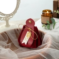 Red velvet and leather wedding favor bag with gold snap button and ribbon detail - Wine Red with Xi Tag