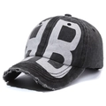 Washed dark grey baseball cap with white HB print and distressed brim details - Black