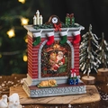 Red brick fireplace Christmas music box featuring Santa and snow globe swirl effect - Red Fireplace