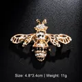 Detail view of gold bee brooch with rhinestones showing size 4.8cm and weight 11g - Bee Shape Style (XD8197-1) / Gold